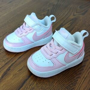 Pink Nike baby shoes size 4
